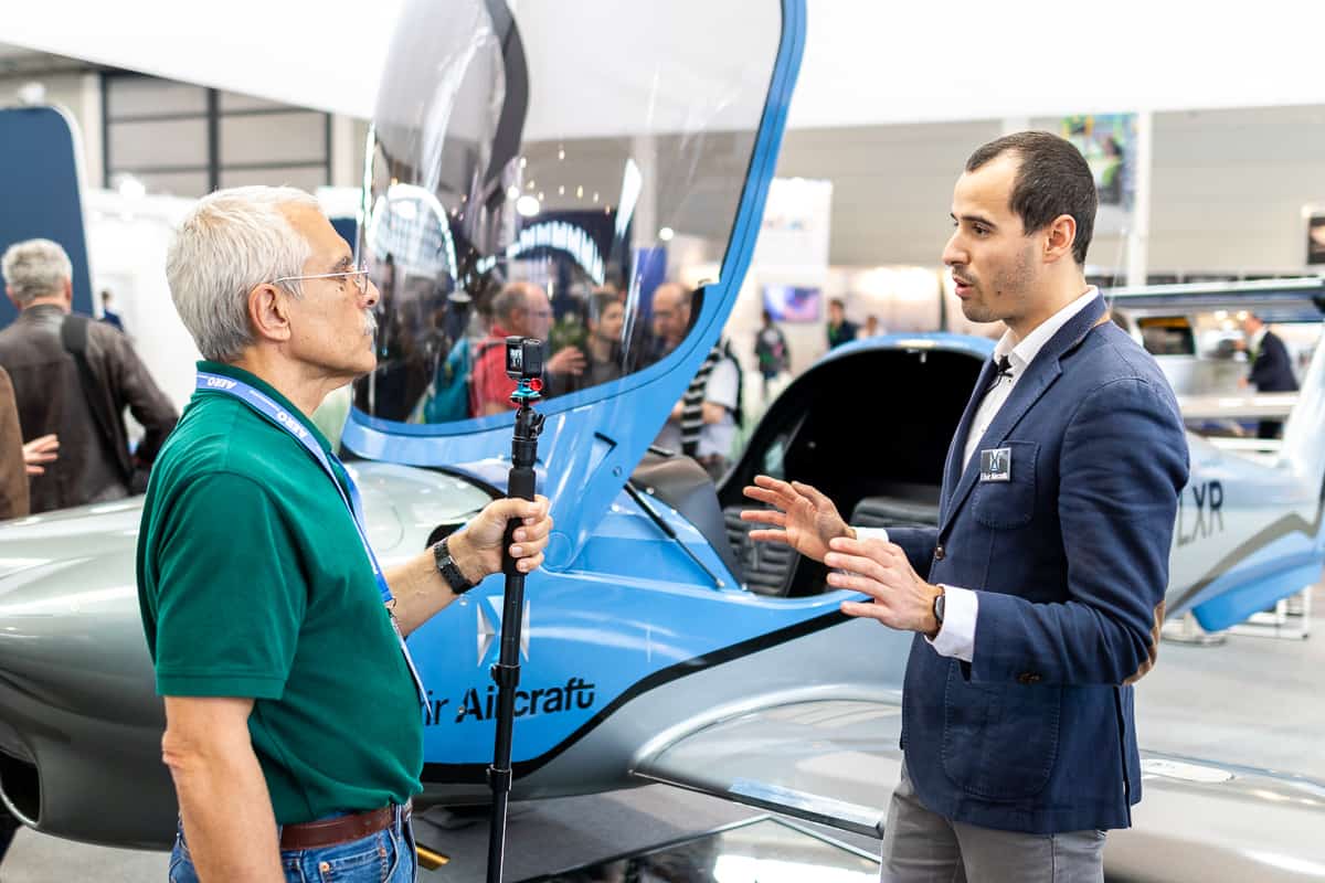 AvWeb's Paul Bertorelli discussing with Elixir Aircraft co-founder Cyril Champenois 